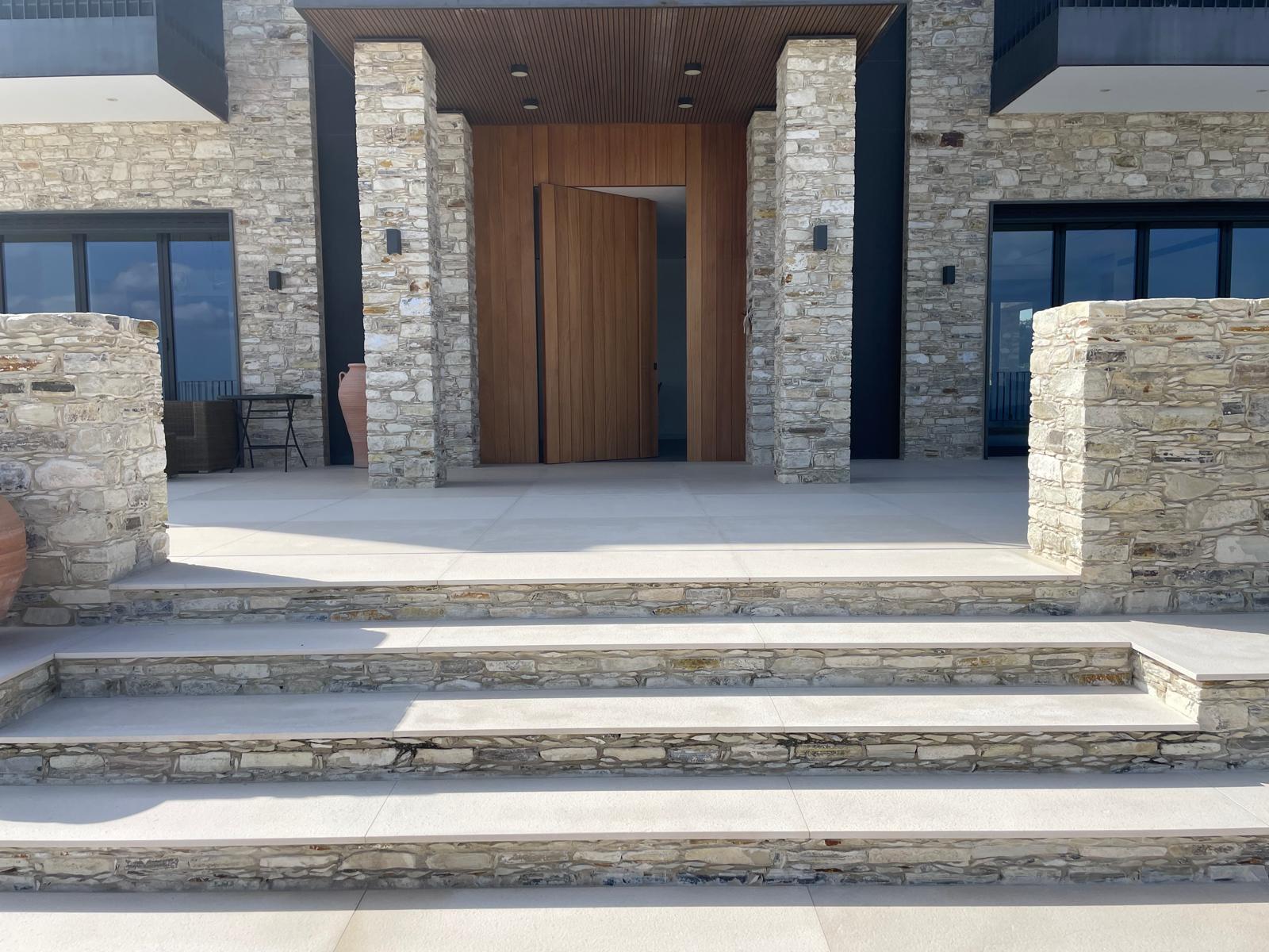 Luxury stone home entrance showcasing C&S Refurb & Constructions quality stonework and craftsmanship
